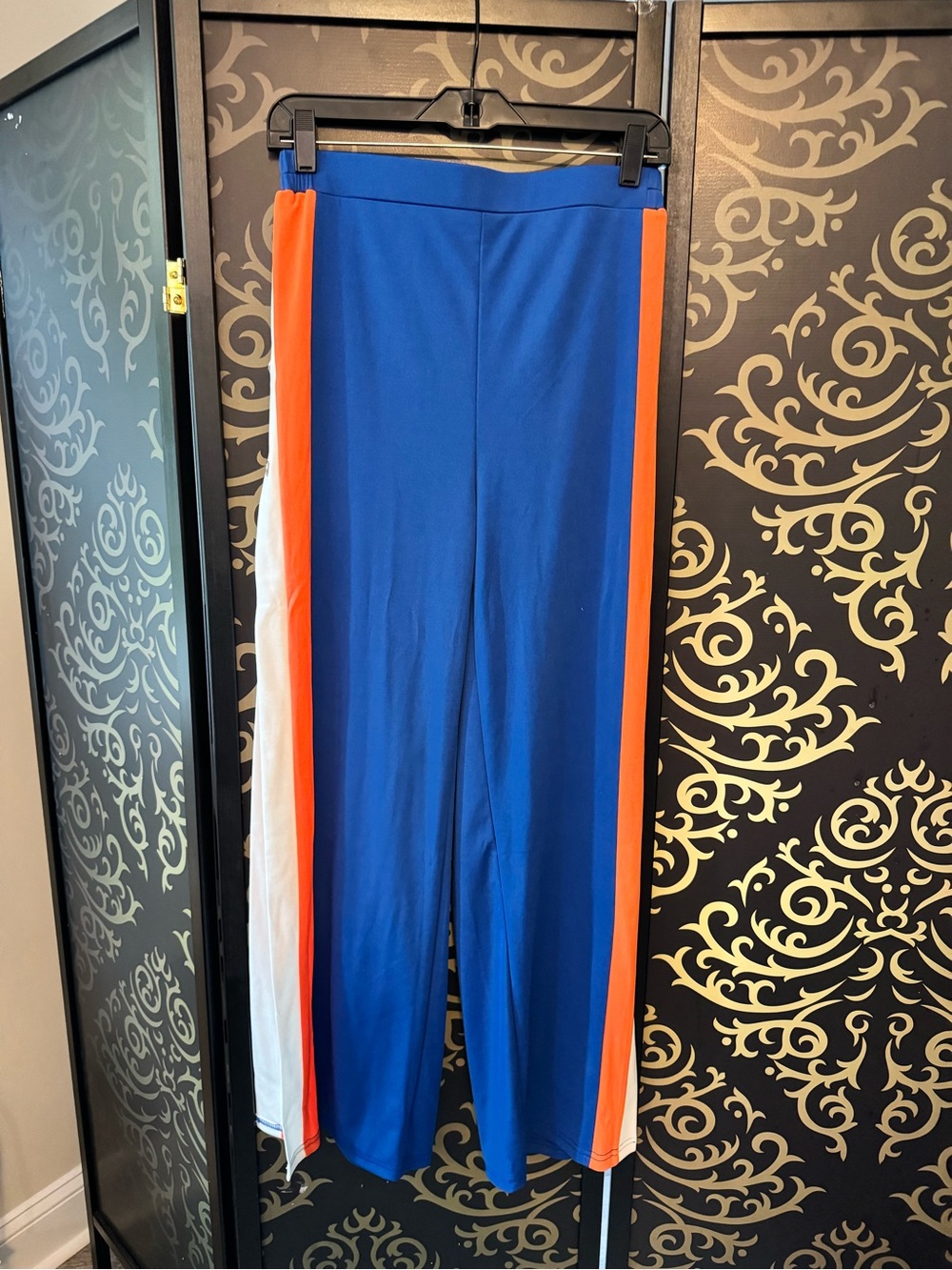 Blue Track Pants with Orange & White Side Stripes